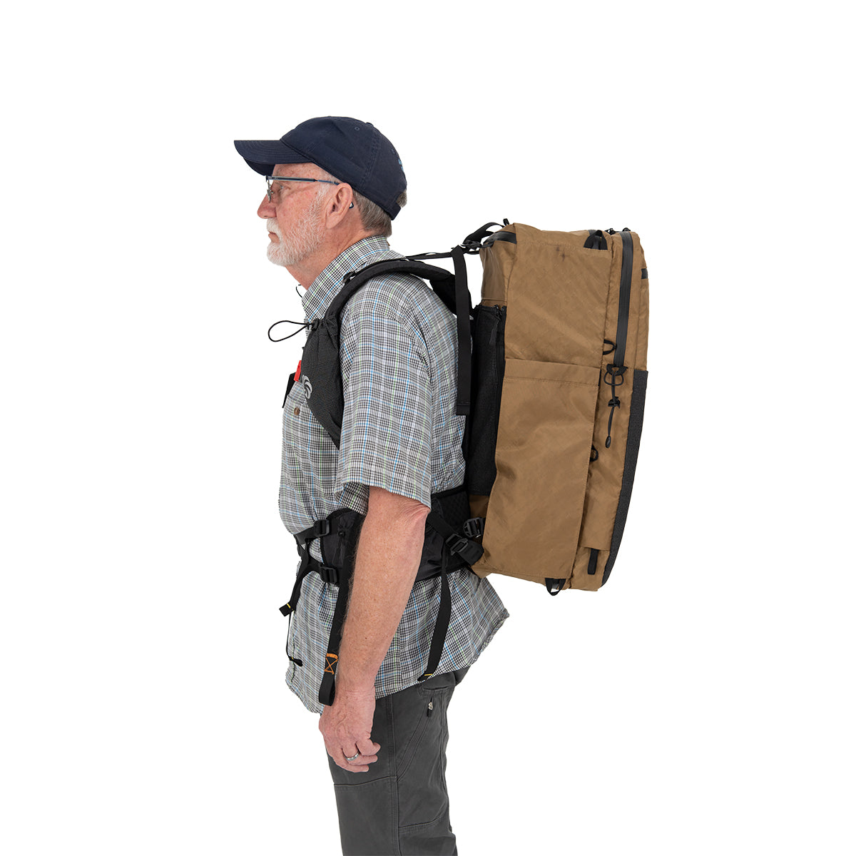 ADC Plus Coyote Brown being worn by a man who is facing the left on a white background