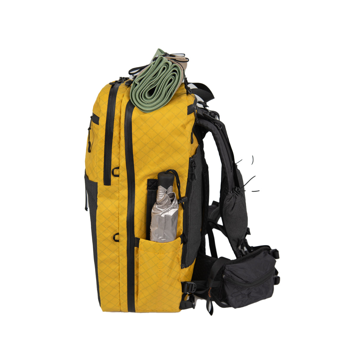 ADC Golden Dazy Right side with a Silver Shadow Mini in the side pocket and a towel strapped on top. on a white background