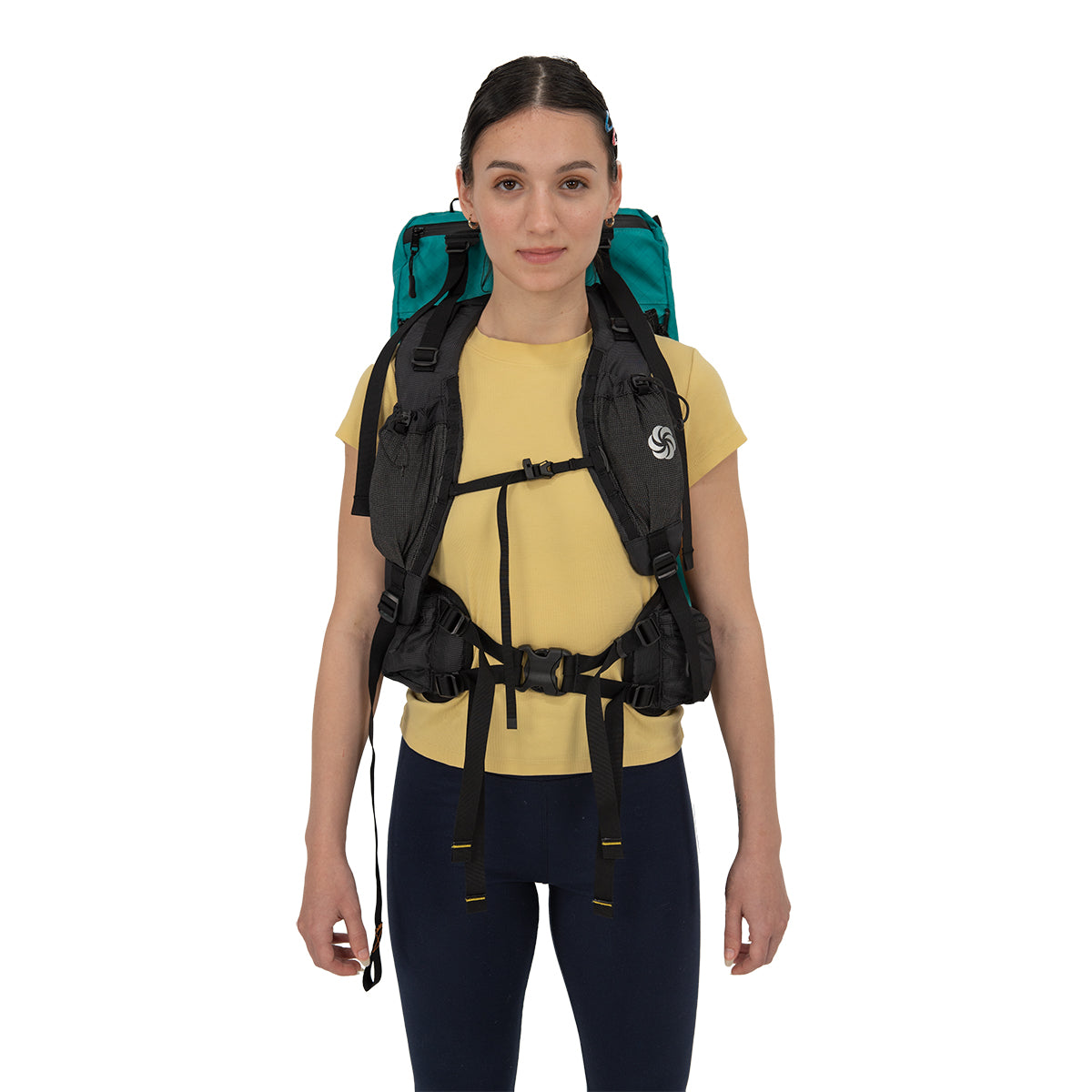 ADC Teal being worn by a person who is facing forward on a white background