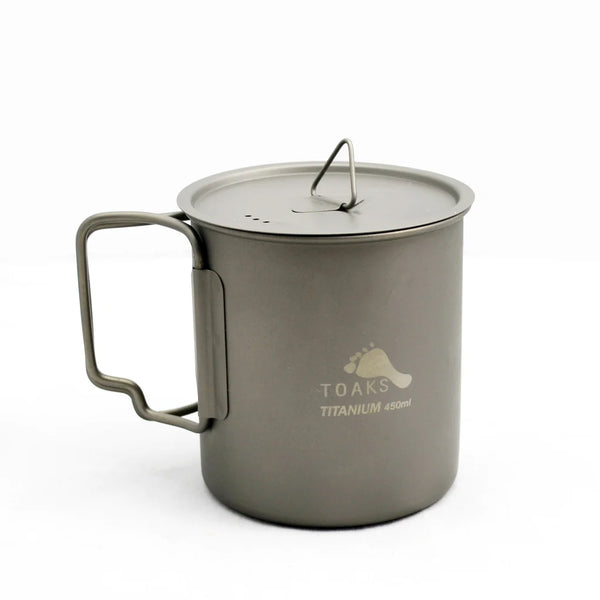 TOAKS 450 mL cup with lid on top.  