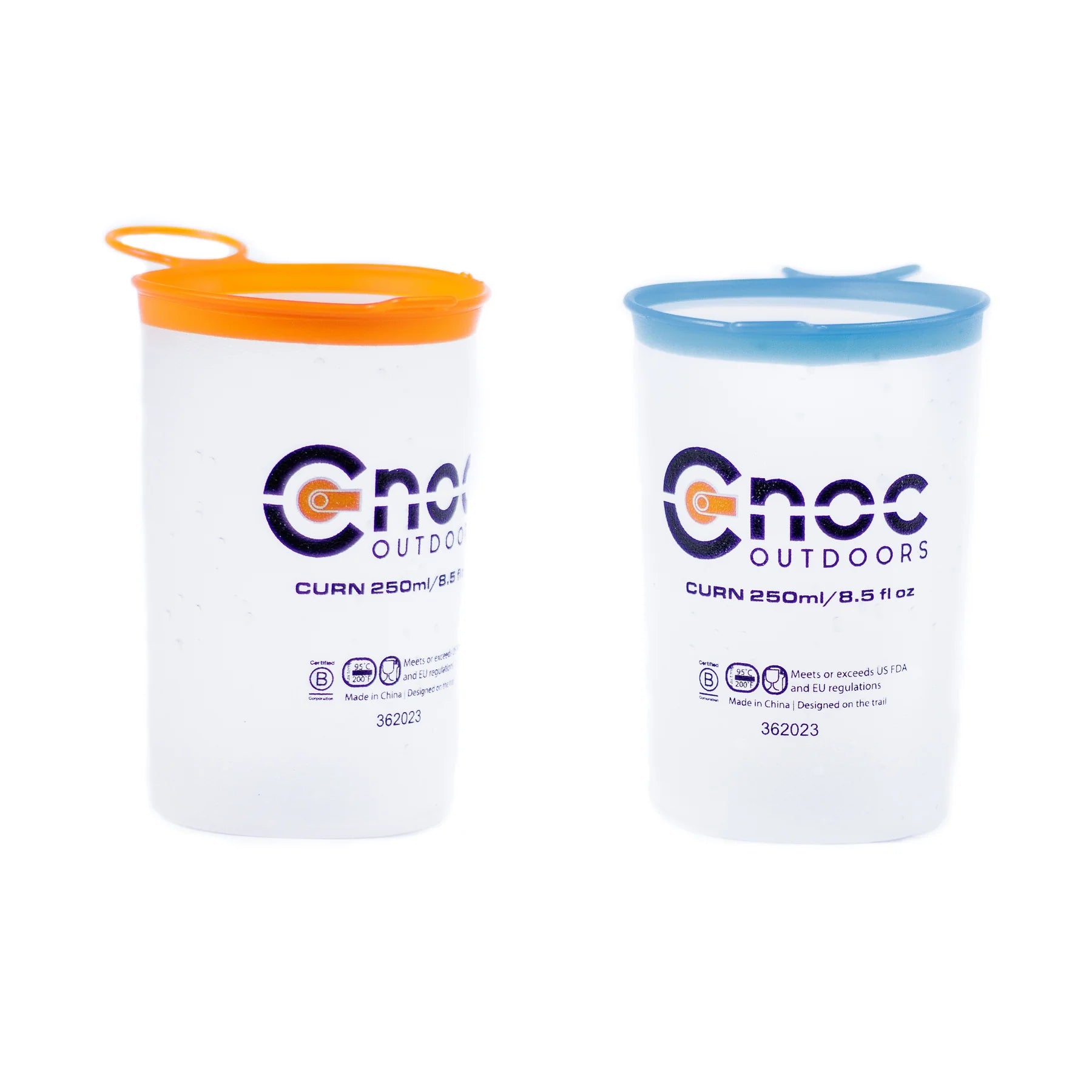 Two frosted Cnoc Outdoors CURN 250ml collapsible cups shown side by side on a white background, one with an orange silicone rim and one with a blue rim, both displaying product certification icons.