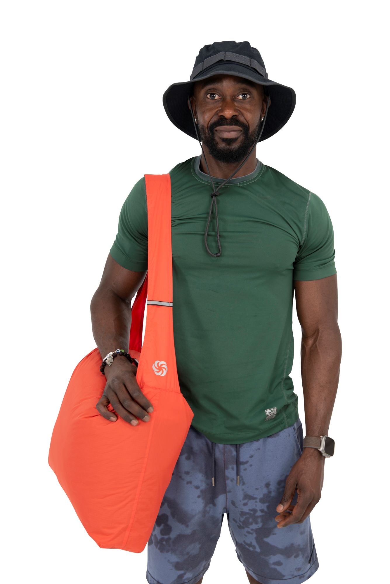 Orange Grocery Go Getter being worn by a man with it slung over his shoulder. 