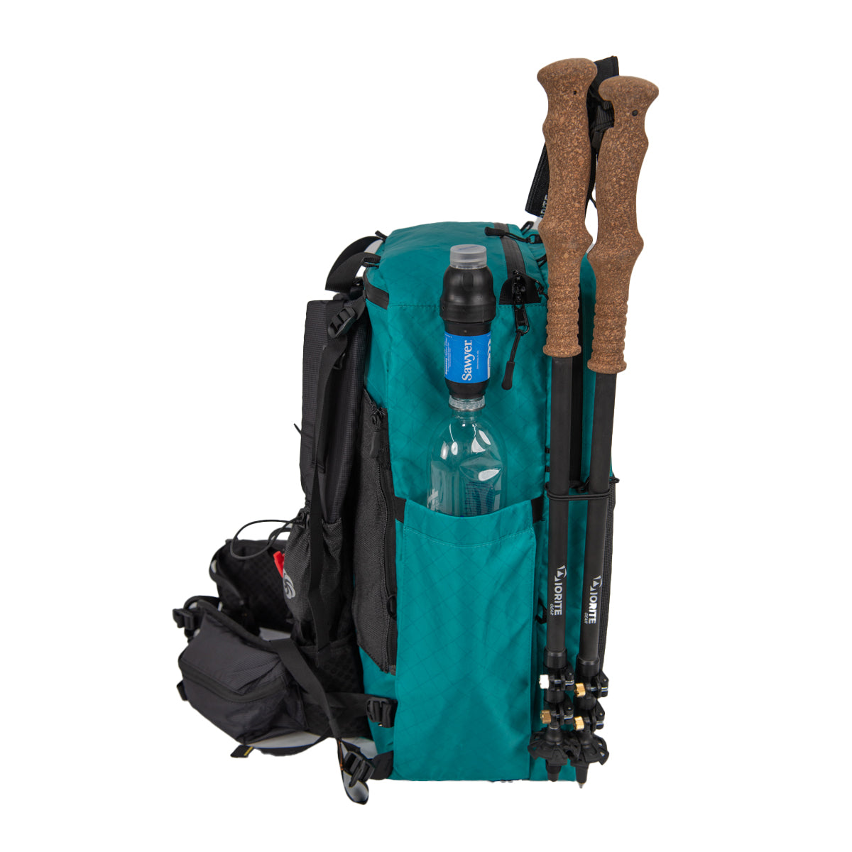 ADC Plus Teal Left side. Smart Water bottle with a Sawyer Filter in the pocket and then trekking poles attached on a white background.  