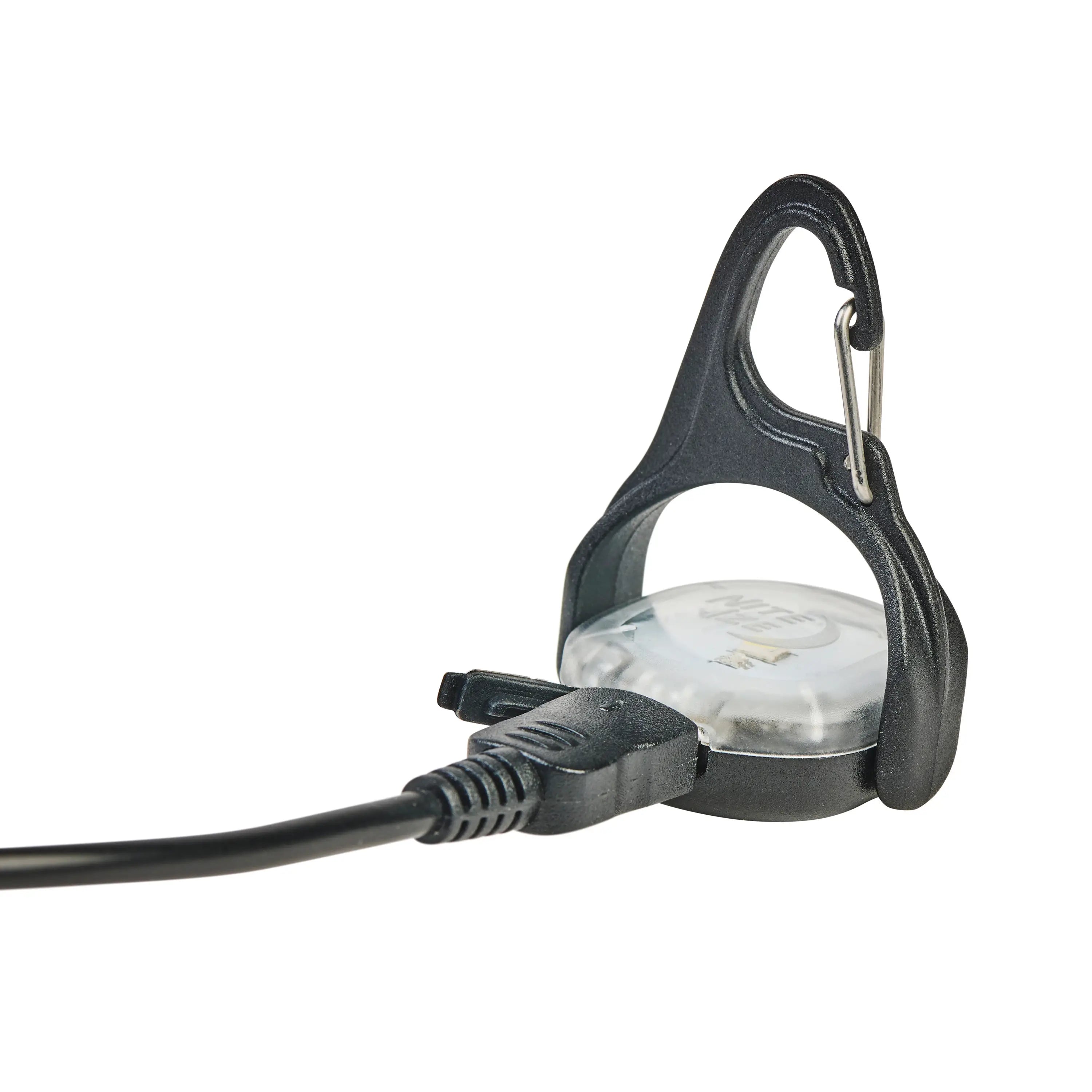 Nite Ize Moonlit Rechargeable Micro lantern laying on a flat white surface with the clip facing up. 