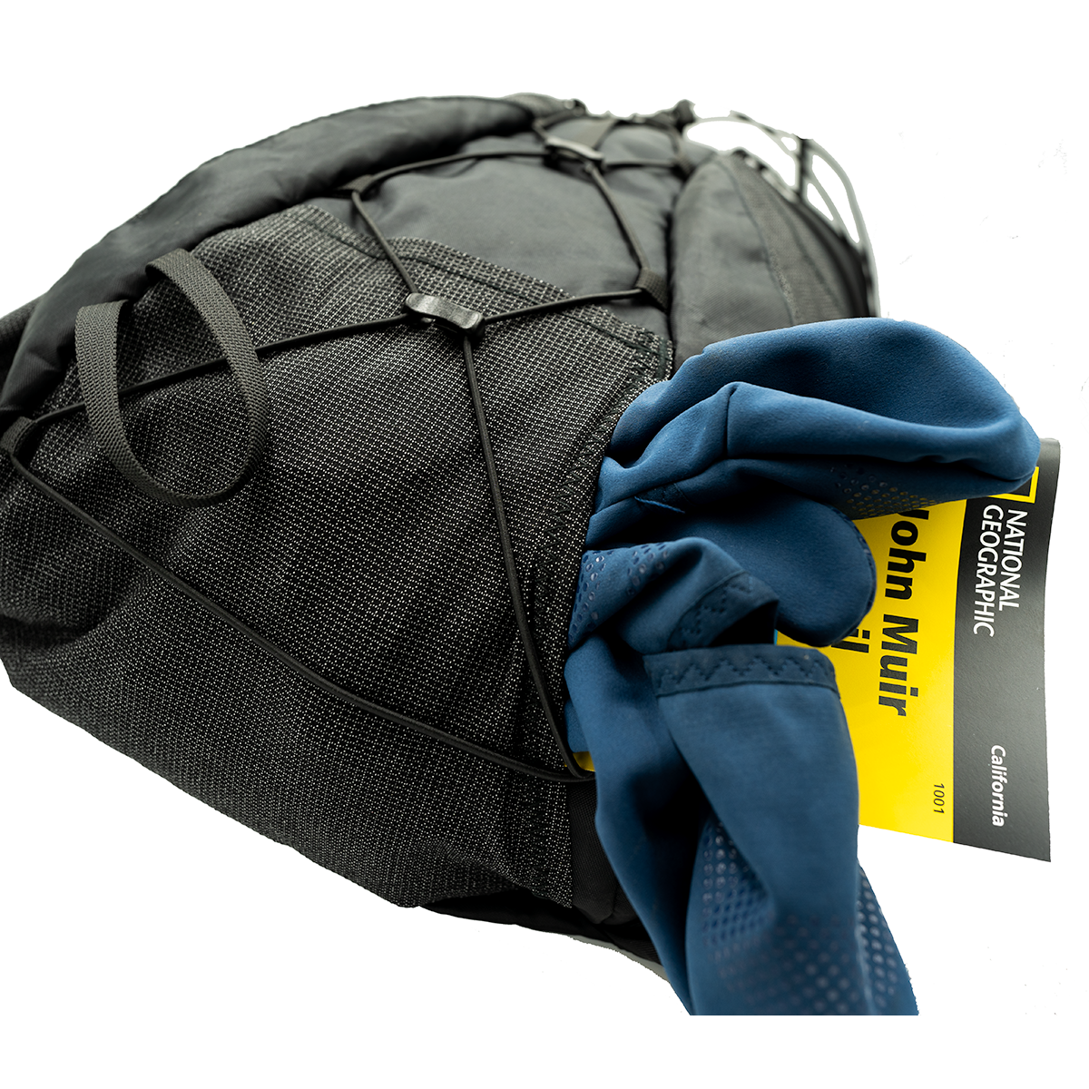 Flight 30 Ultra Running Backpack bottom pocket with map and gloves