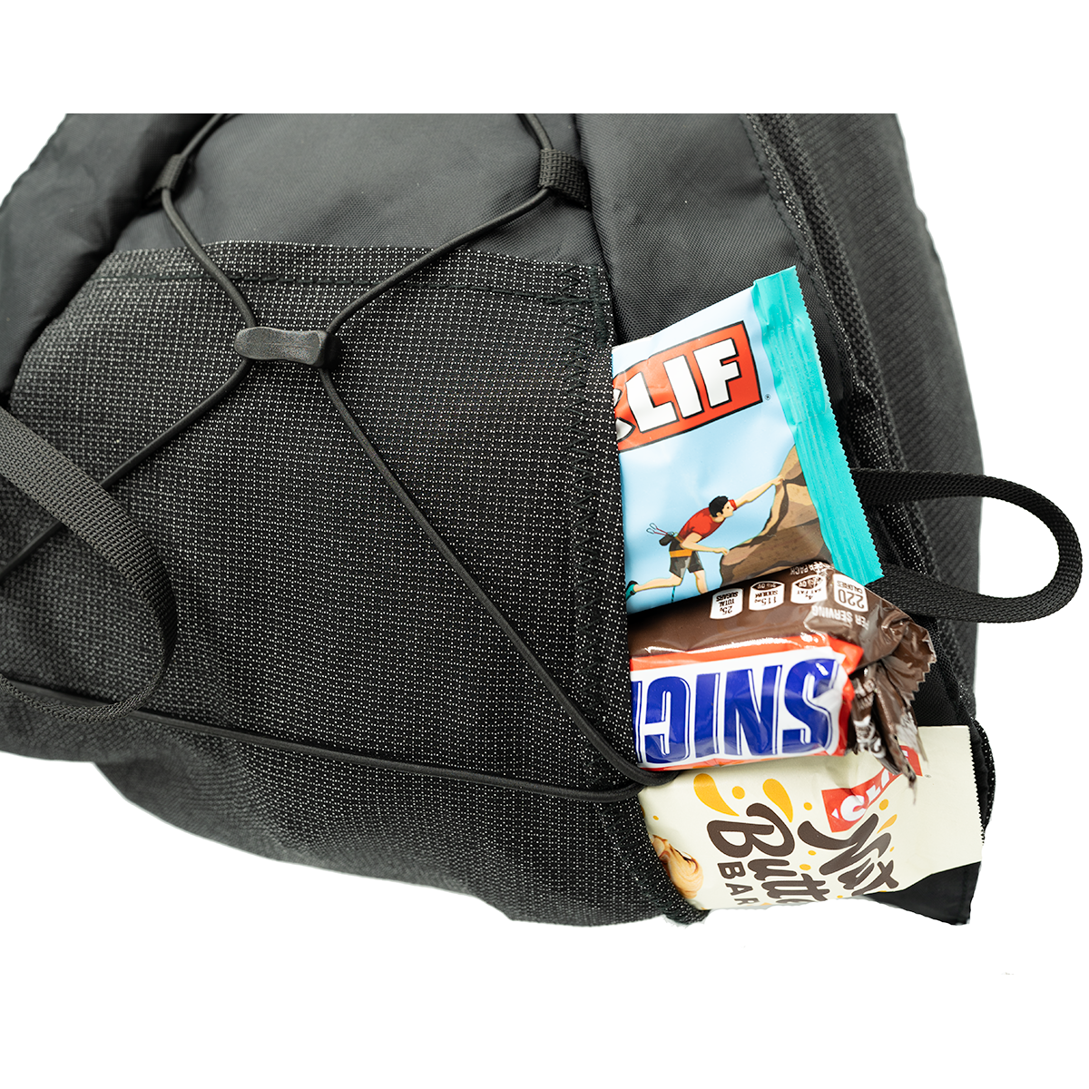 Flight 30 Ultra Running Backpack bottom pocket with snacks