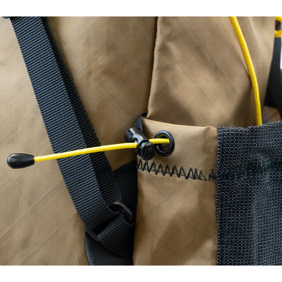 Minimalist V2 Ultralight Backpack side pocket cord lock detail